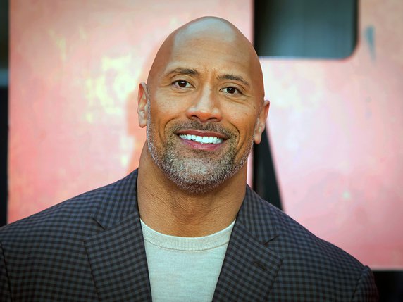 Dwayne "The Rock" Johnson a de quoi sourire: avec 87,5 millions de dollars gagnés en un an, il est désigné l'acteur le mieux payé d'Hollywood pour la 2e année consécutive (archives). © KEYSTONE/AP/Vianney Le Caer